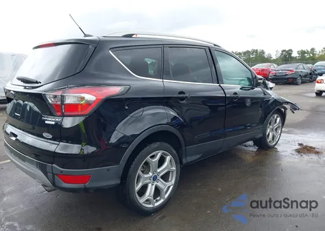 2017 Ford Escape Titanium z USA, uszkodzony, nr VIN 1FMCU0J95HUA75324